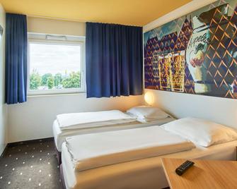 B&B Hotel Frankfurt-Nord - Francoforte - Camera da letto