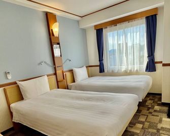 Toyoko Inn Hiroshima Heiwa-odori - הירושימה - חדר שינה