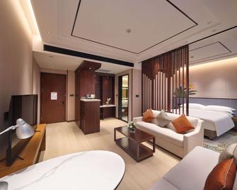 Hilton Garden Inn Anshan - Аньшань - Спальня