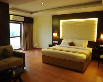 Castle International Premium Hotel - Kushālnagar - Bedroom