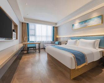 in Hotel (Xiangyang Erqi Store) - Xiangyang - Schlafzimmer