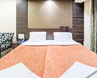 Hotel Okasu - Raipur - Slaapkamer