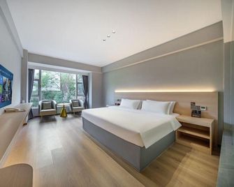 Garden Hotel - Neijiang - Bedroom