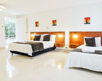 Hotel Thama Palmira - Palmira - Habitación