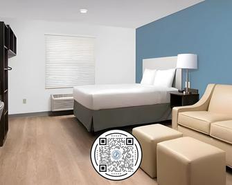 Woodspring Suites Houston 288 South Medical Center - יוסטון - חדר שינה