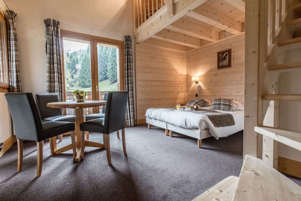 Hôtel Club le Crêt - מורזין - חדר שינה