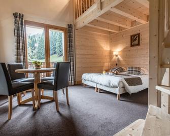 Hôtel Club le Crêt - מורזין - חדר שינה