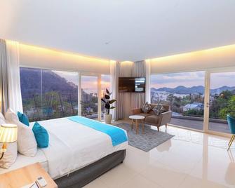 Zasgo Hotel - Labuan Bajo - Schlafzimmer