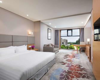 Ramada by Wyndham Beijing Airport - Beijing - Bedroom