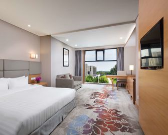 Ramada by Wyndham Beijing Airport - Peking - Makuuhuone