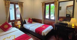 Golden Lotus Place - Luang Prabang - Schlafzimmer