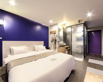 Busan Oncheonjang Hotel Carino - Busan - Bedroom