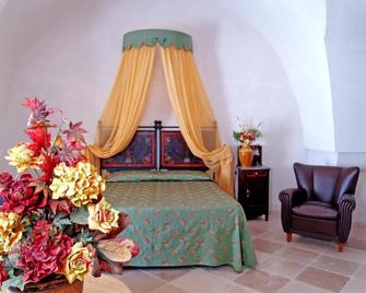 Hotel Masseria Tutosa - Ostuni - Schlafzimmer