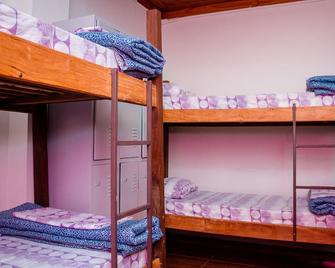 É Hostel - Ouro Preto - Camera da letto