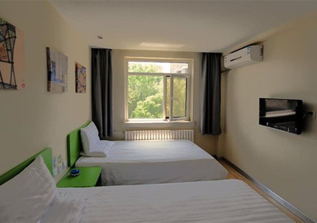 Hi Inn Dalian Airport Branch - داليان - غرفة نوم