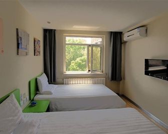 Hi Inn Dalian Airport Branch - داليان - غرفة نوم