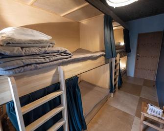 Kamp Houkan-cho Backpacker's Inn & Lounge - Okayama - Schlafzimmer