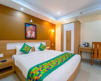 Treebo Sree Varshavilas Regency, 2 Mins From Guruvayoor Temple - Guruvayoor - Schlafzimmer