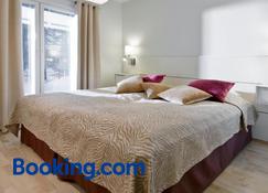 Holiday Club Kuusamon Tropiikki Apartments - Kuusamo - Makuuhuone
