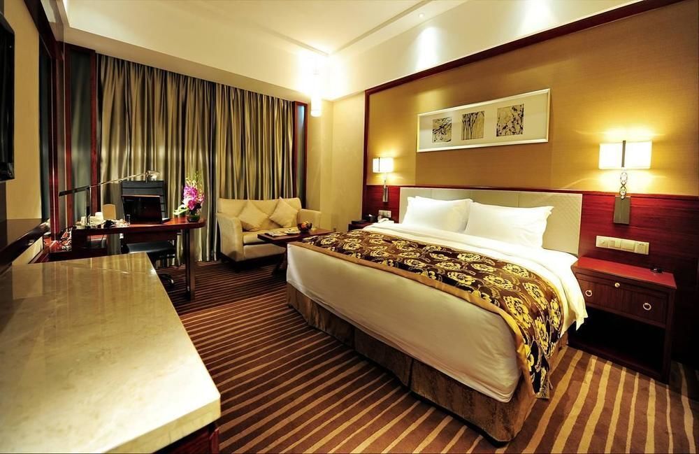 Xiangsheng Century Hotel Zhuji - שאושינג - חדר שינה