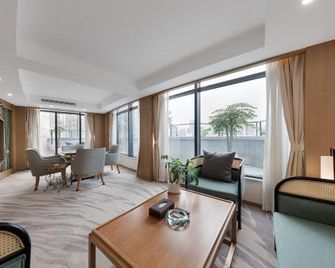 Chengdu Pearl International Hotel - Chengdu - Sala de estar