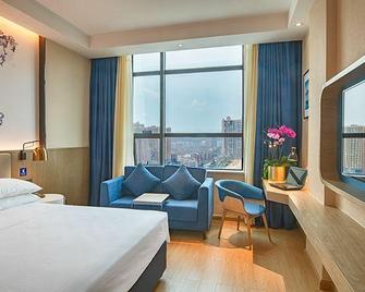 Chenzhou Amigo Mige Hotel - Chenzhou - Schlafzimmer