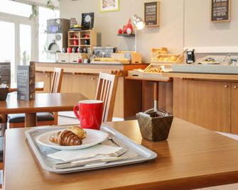 Ibis Bourg-en-Bresse Jasseron-A 40 - Bourg - Salle à manger