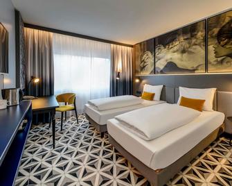 Mercure Hotel Freiburg am Münster - Freiburg im Breisgau - Makuuhuone