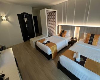 Numsai Khaosuay Resort - Ranong - Schlafzimmer