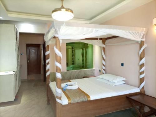 Eden Palms Resort - מומבסה - חדר שינה