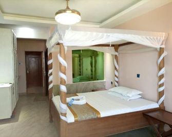 Eden Palms Resort - מומבסה - חדר שינה