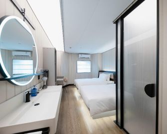 Hanting Hotel Shanghai Caobao Road Railway Station - Shangai - Habitación