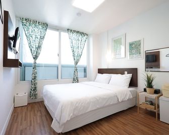 Ekonomy Haeundae Hostel - פוסן - חדר שינה