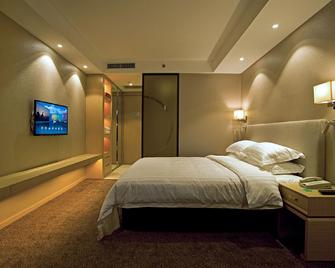 New Dynasty Hotel - Kaifeng - Schlafzimmer