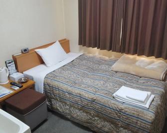 Hotel Miyako Hills - Miyako - Schlafzimmer