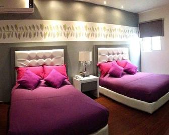 Hotel Centinela Grand - Arandas - Bedroom