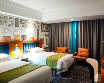 Beer Holiday Hotel - Jinhua - Κρεβατοκάμαρα