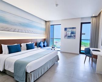 Wyndham Garden Ajman Corniche - Ajman - Schlafzimmer