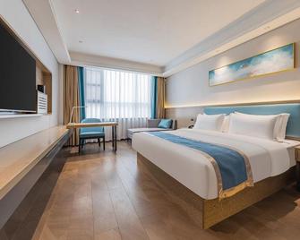 in Hotel (Xiangyang Erqi Store) - Xiangyang - Camera da letto