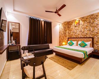 Treebo Luxury Stay Premium Inn - Noida - Ložnice