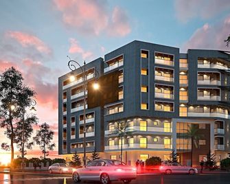 Lux Haven 2-Bedroom Apartment - Prime Location & Modern Comfort Near Gulberg - Lahore - Edificio