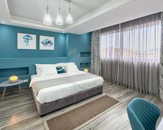 O'Beach Boutique Studios - Flic en Flac - Chambre