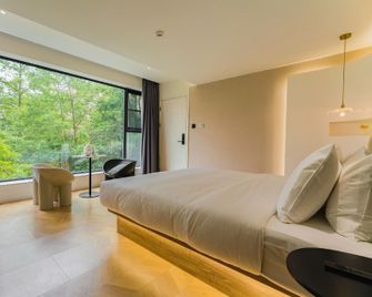 Ananas Polaris Hotel (Tongde Kunming Plaza Beichen Fortune Centre) - Kunming - Sovrum