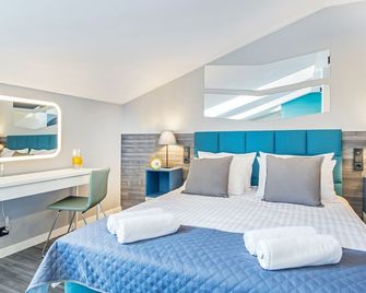 كراكوف سنترال أبارتمنتس - كراكوف - غرفة نوم