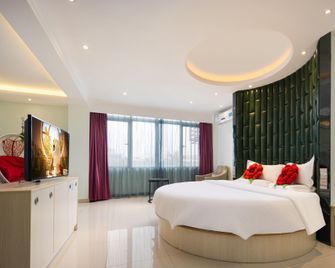 Jiajie Boutique Hotel (Haikou East High-speed Railway Station) - Haikou - Bedroom