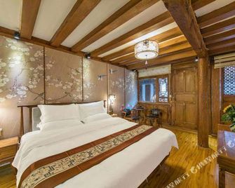 Wande Yuege (Lijiang Ancient City Sifang Street Branch) - Lijiang - Bedroom