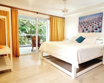 Blue Mango Hotel - Guachaca - Спальня