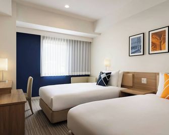 Four Points Flex by Sheraton Kobe Sannomiya - קובה - חדר שינה