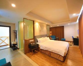 Emei Mountain Xileer Hotel - Le-šan - Ložnice