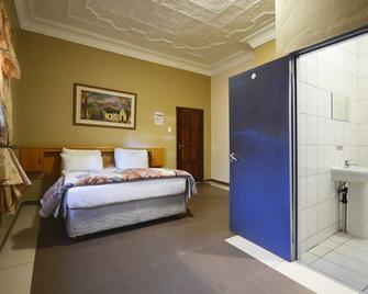 Legacy Guest Lodge - Johannesburg - Schlafzimmer